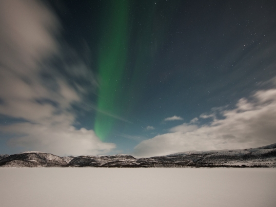 Aurora over frozen-lake